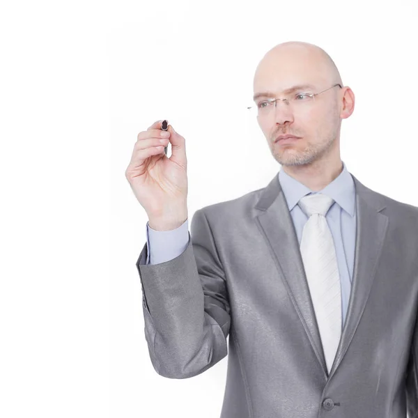 Handsome businessman pointing the marker at the virtual point — Stock Photo, Image