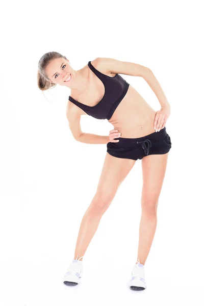 Concepto de salud: mujer de negocios joven realiza ejercicio físico — Foto de Stock