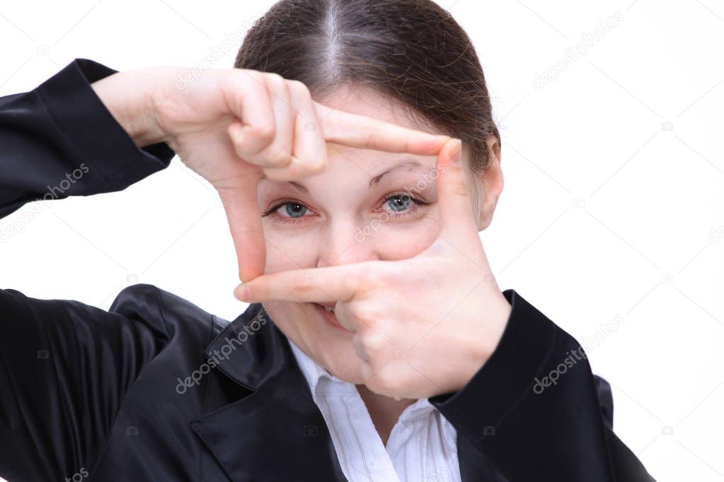 young business woman showing a frame of his fingers near her face. isolated on white.