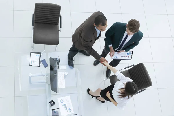 View from the top.the handshake business partners at a business meeting — Stock Photo, Image