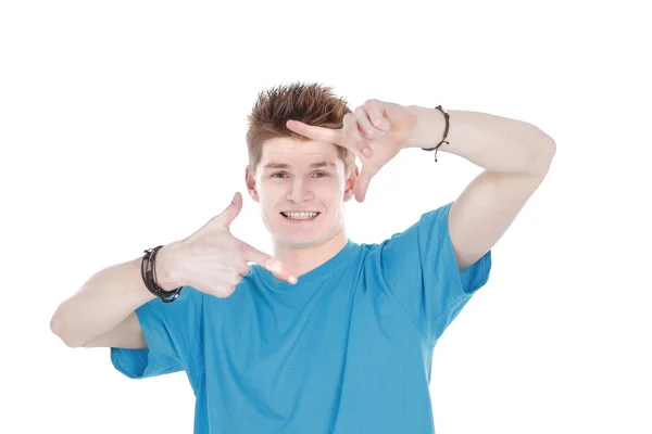 Ragazzo con la camicia blu, mostrando la cornice dalle mani — Foto Stock