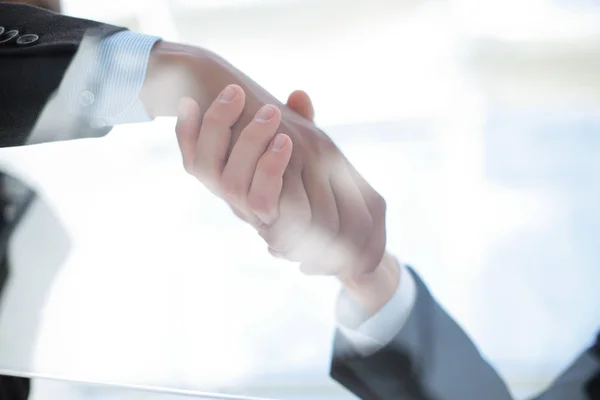 Business background. handshake of business partners above the Desk. — Stock Photo, Image