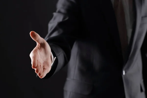 Close up.business men holding out his hand for a handshake — Stock Photo, Image