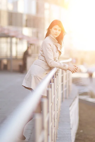 Businesswoman standing on the terrace near the business center. — Stock Photo, Image