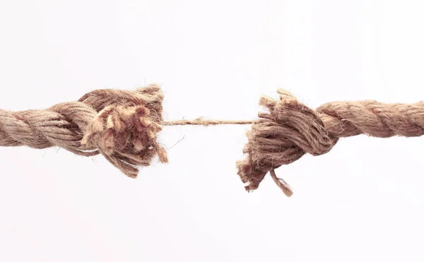 Closeup.old frayed rope .isolated on a white background. Stock Image