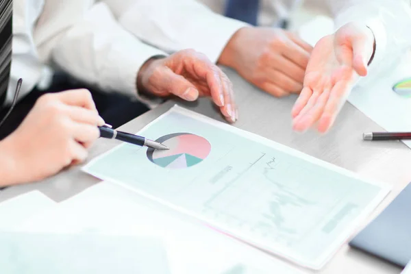 Closeup. professional business team discussing marketing data — Stock Photo, Image