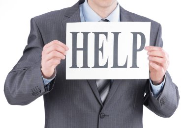 genç işadamı yardım söylüyor bir levha gösterilen