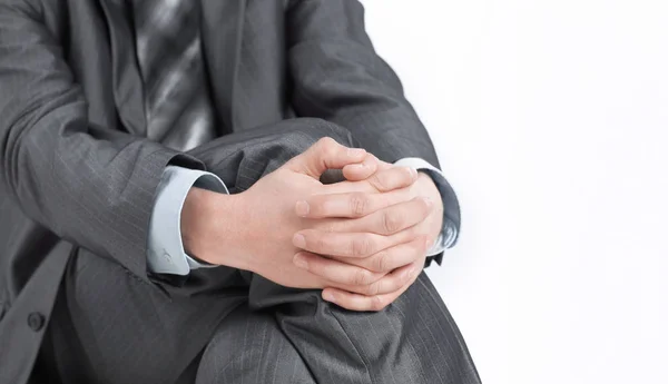 Nahaufnahme. Geschäftsmann sitzt auf einem Bürostuhl — Stockfoto