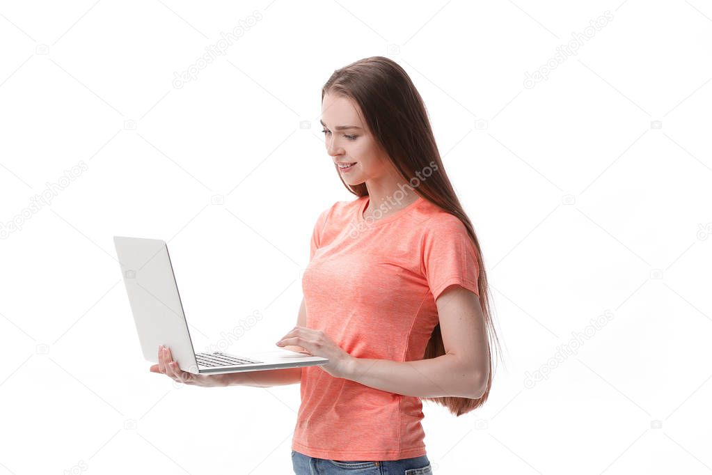 attentive girl student with laptop.isolated on white background