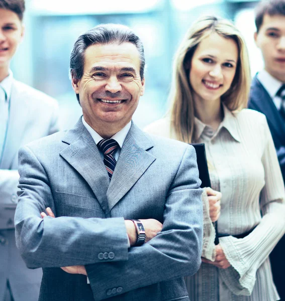 Group portrait of a professional business team looking — Stock Photo, Image