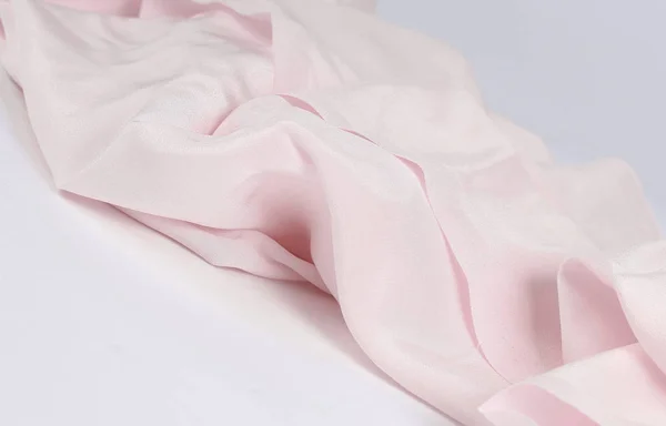 Closeup.transparent lichte sjaal op een lichte achtergrond — Stockfoto