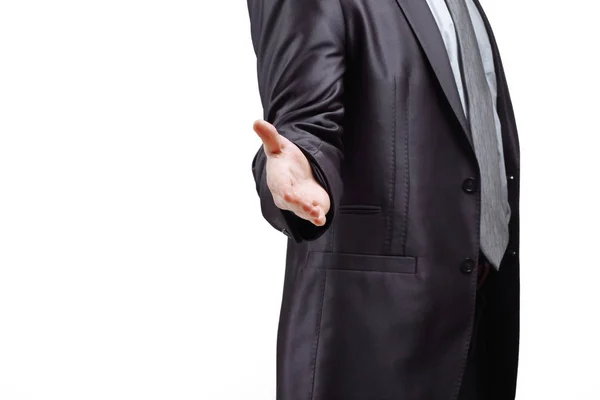 Successful businessman reaches out for a handshake.isolated on grey background — Stock Photo, Image