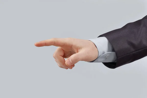 Fecha. mão de um empresário apontando para uma cópia space.isolated em fundo cinza — Fotografia de Stock