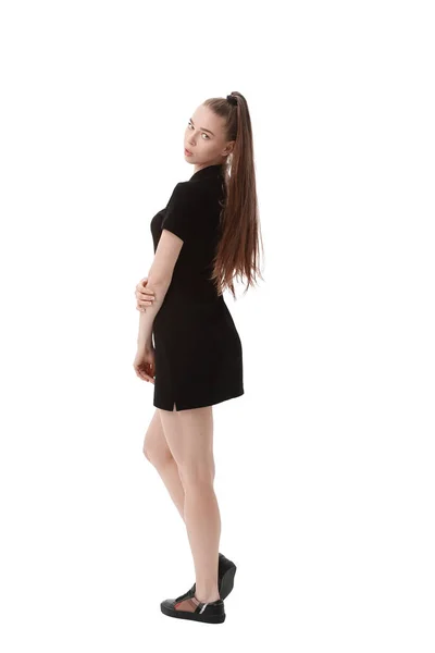 Rückansicht. Schöne Frau Modell in kurzen schwarzen Kleid. Isoliert auf weiß — Stockfoto