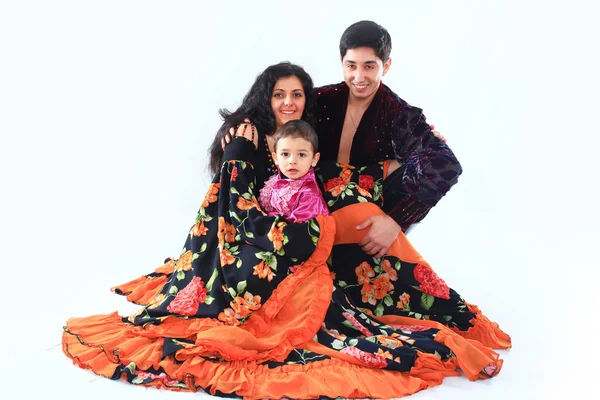 Portrait of a Gypsy couple with a cute son in their national costumes — Stock Photo, Image
