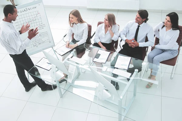 Top view.business team at presentation of a new financial project. — Stock Photo, Image