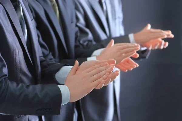 Close up.a group of business people applauding standin — Stock Photo, Image