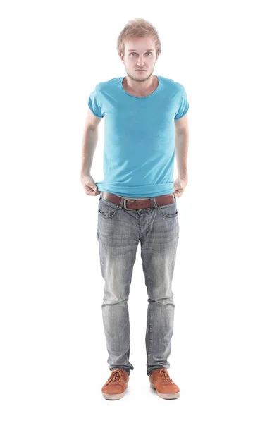 Retrato de un joven con estilo en una camiseta y jeans — Foto de Stock