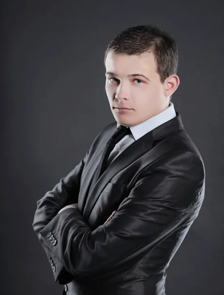 Retrato de um homem de sucesso em um negócio suit.isolated em preto — Fotografia de Stock