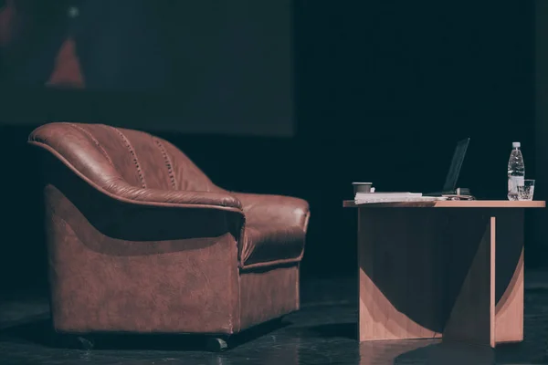 Table and chair speaker on the stage of the business club — Stock Photo, Image