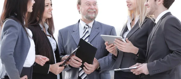 Close up.a business team standing talking in the office — Stock Photo, Image