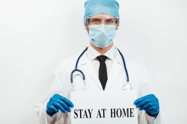 Kapat. Doktor ilanı evde gösteriyor..