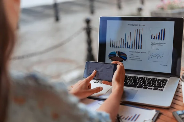 close up. business woman analyzing financial data.