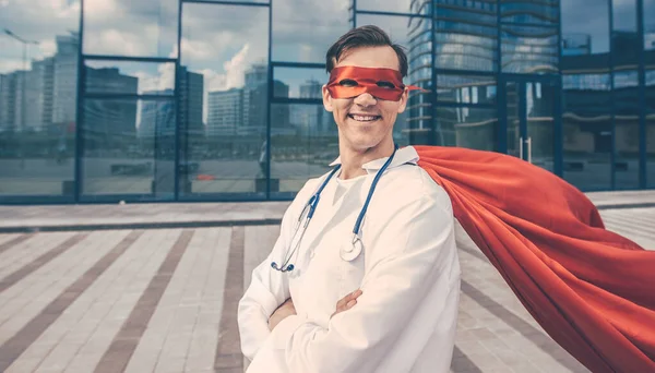 Close up. smiling doctor superhero looking forward. — Stock Photo, Image