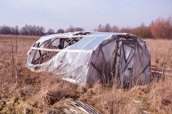 Broken Abandoned Plastic Greenhouse Hothouse Early Spring — Stock Photo, Image