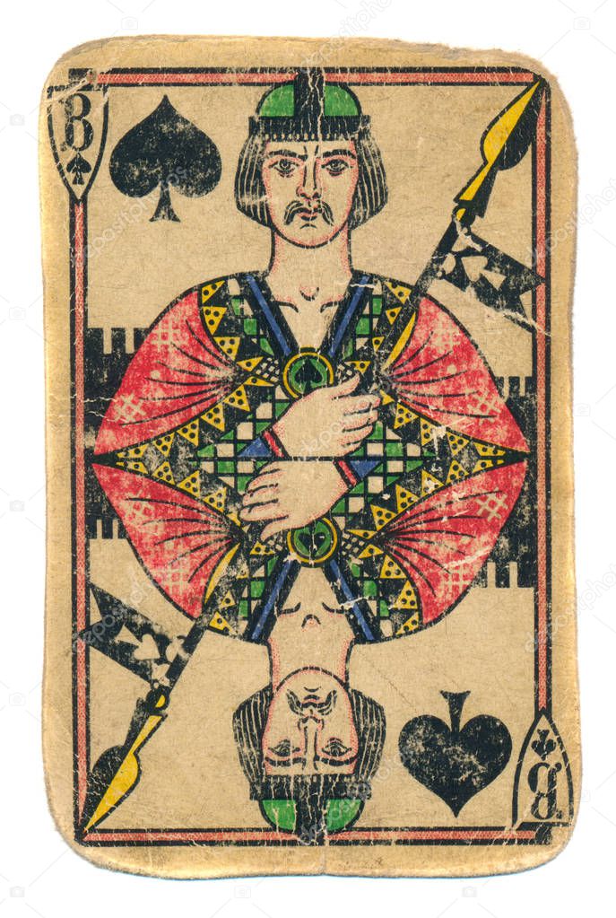 Old antique used playing card jack of spades isolated on white