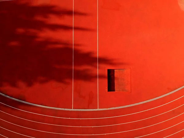 Abstrakter Roter Stadionhintergrund Mit Leichtathletikbahnen Luftaufnahme — Stockfoto