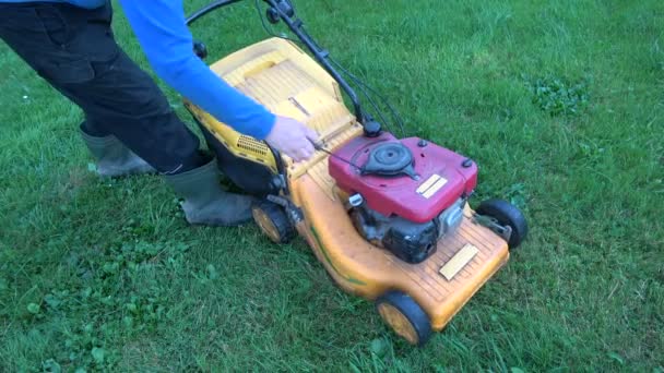 Gardener Starting Lawn Mower Garden Grass — Stock Video