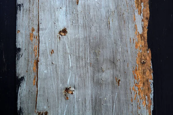 Pared de madera vieja pintada, fondo agrietado — Foto de Stock