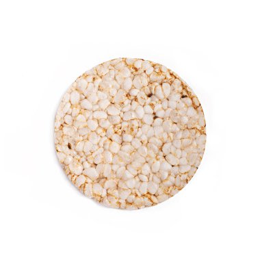 Beyaz arka planda izole edilmiş kabarık pirinç ekmeği. Diyet pirinç ekmeği. Üstte görüntü.