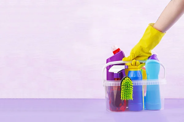 Cleaning service concept. Colorful cleaning set for different surfaces in kitchen, bathroom and other rooms. — Stock Photo, Image