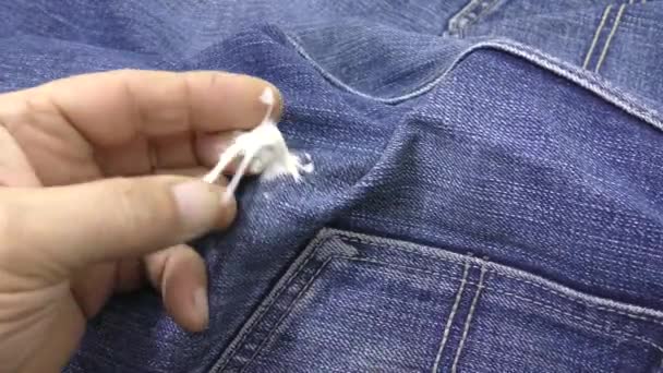 Man Trying Remove Chewing Gum Adhering Jeans — Stock Video