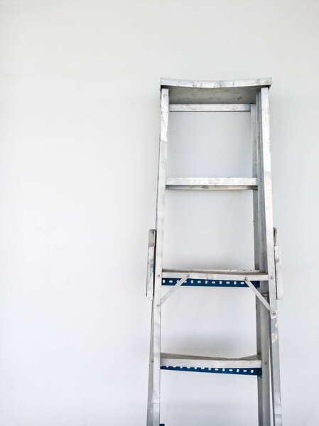 The aluminum foldable ladder.