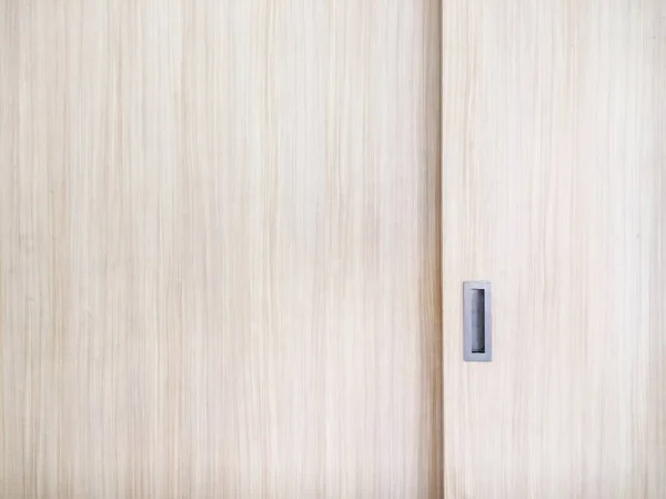 Wooden cabinet slide door with the metal handle. — Stock Photo, Image