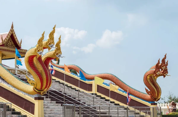 Side view of the three head golden and bronze great naga sculptu — Stock Photo, Image