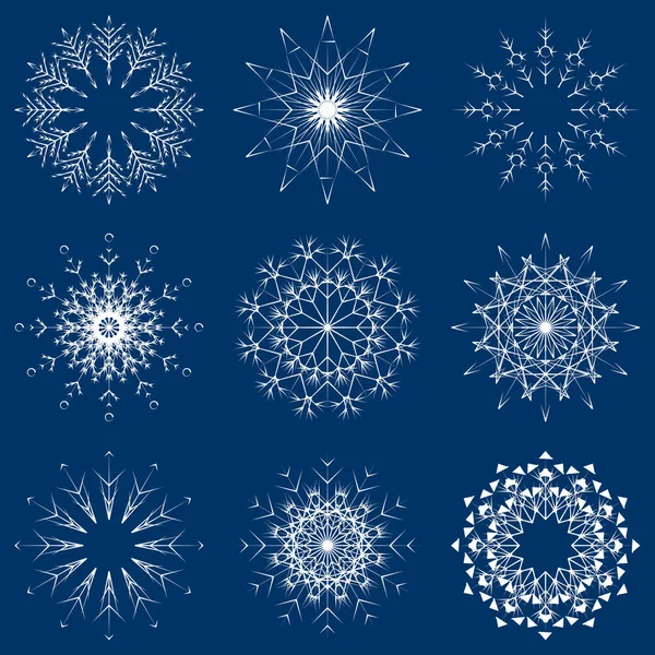 Samling Konstnärliga Isiga Abstrakt Kristall Snö Flingor Isolerade Blå Bakgrund — Stockfoto