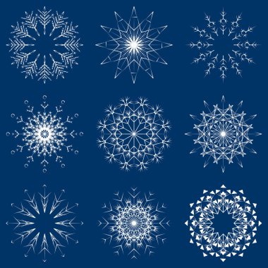 sanatsal buzlu soyut kristal kar taneleri üzerinde mavi arka plan izole topluluğu     