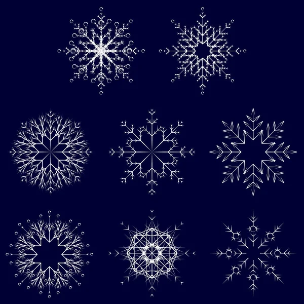 芸術的な氷のような抽象的な結晶雪のコレクションはフレーク冬 月装飾グループまたはコレクションとしての孤立した背景です 氷や霜の美しい飾りのシルエットや季節のアートをスター — ストック写真