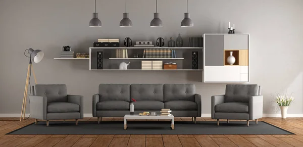 现代化的客厅 配有灰色沙发 扶手椅和墙上的书柜 — 图库照片