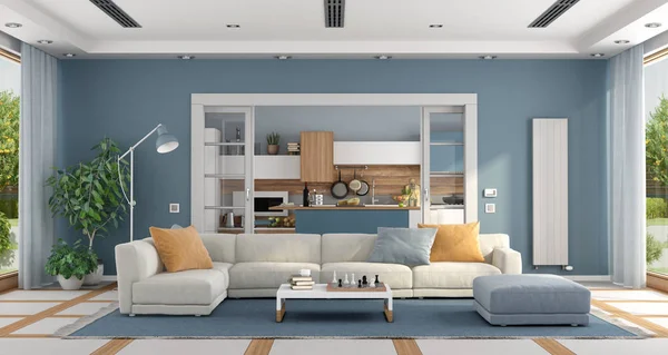 Obývací pokoj s pohovkou a moderní kuchyní na pozadí — Stock fotografie