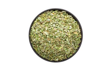 beyaz bir arka plan üzerinde izole kase, üstten görünüm, kurutulmuş kekik. organik baharat