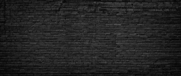 Black brick wall, texture of dark brickwork close-up — Stock Photo, Image