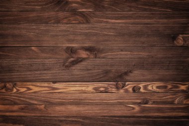 Yüksek çözünürlüklü koyu kahverengi ahşap arka plan. Üstgörünüm Kopya