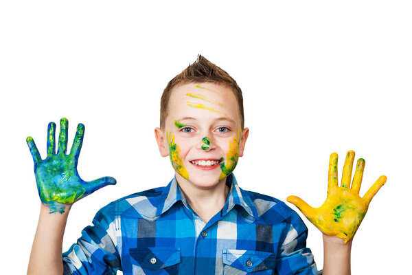 Portrait little boy smeared hands in paint. Isolated on white background