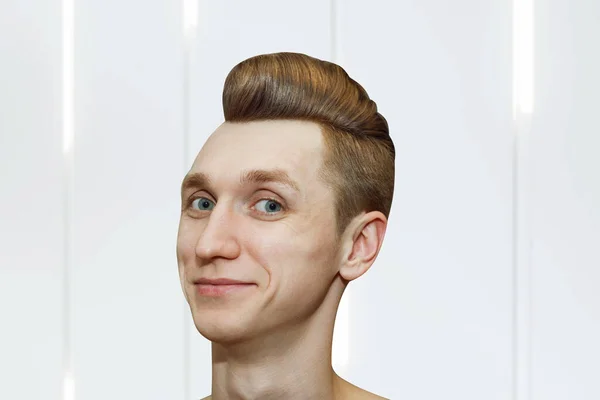 Young ginger man with pompadour haircut, real photo hair for barbershop old fashioned, side.