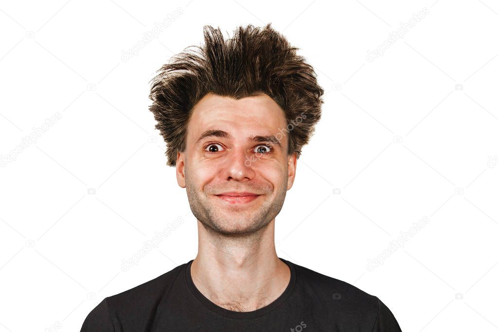 Shaggy laughing young guy with long hair happy on a white isolated background.
